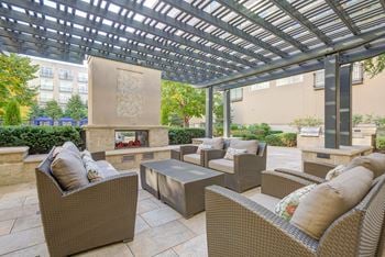 Fireplace with outdoor grilling and dining areas